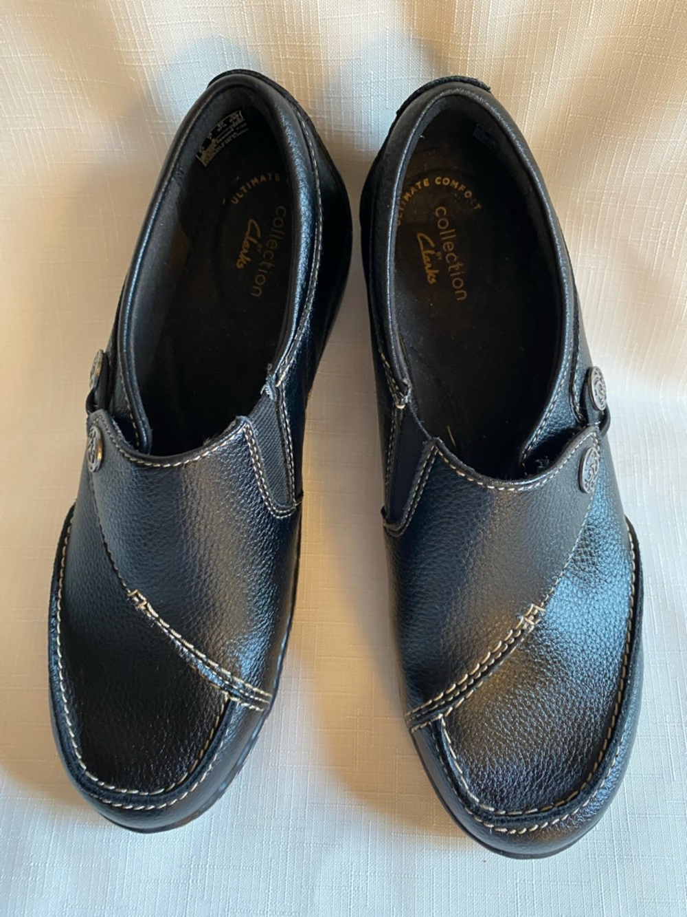 Clarks Black Women’s Slip-On Loafers with Contrast Stitching
